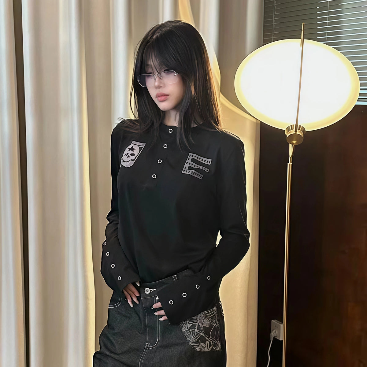 Women Henry Collar Long Sleeve Top Skull Badge Print Eyelet Decor
